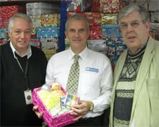 (L to R) Tony Holmes, Centre Manager at Samaritan’s Purse Processing Centre, Stoke; with Keith Walker, Owner of Recognition Express North  Staffordshire and Ian Taylor, Samaritan’s Purse.