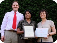 Mallika with MD Chris Jones on left and Director of English Pat Jones on right.