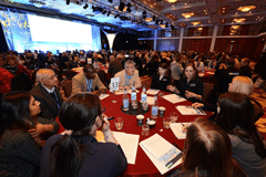 Taxassist conference attendees at tables