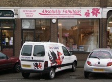 Dcc F F D F Dedf F Fe A Shop front and car before