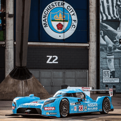 Vehicle-wrap-in-Manchester-City's-colours.png