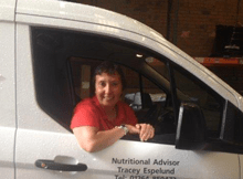 Woman leaning out of van window