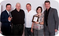 (l-r) Ricky Gervais lookalike, Carl Smith, Matthew Wilson, Kirsty Wilson and FASTSIGNS UK Managing Director Garth Allison