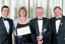 Franchise of the Year winners Ruth Dawe and Laurence Fitch with sponsors EDF (lt) Energy and Sir Bernard Ingham (rt)  