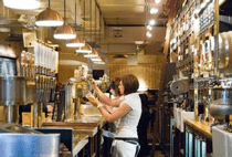 Barmaids pulling pints