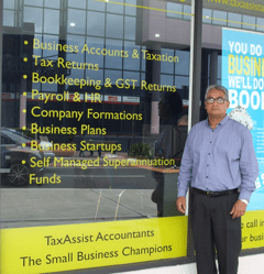 Man in front of shop