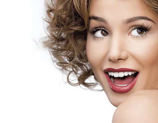 A woman smiles after Relooking services