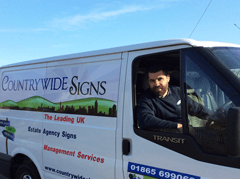 Man leaning out of van window